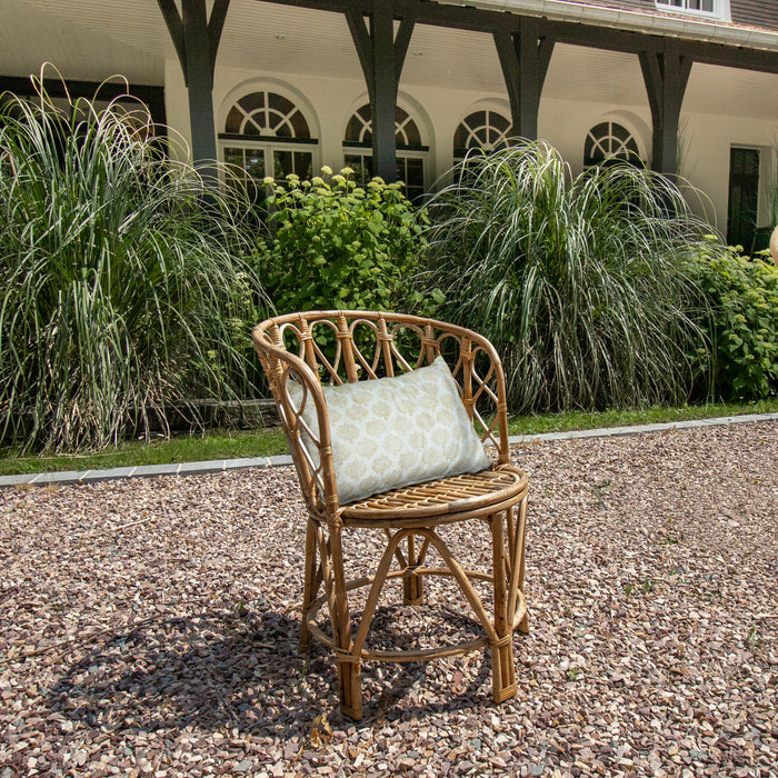 Fauteuil Katavi en rotin tressé et coussin en coton